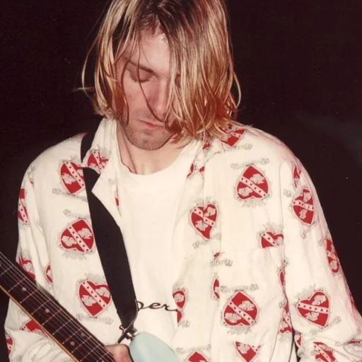 Эмодзи Kurt Cobain 😶
